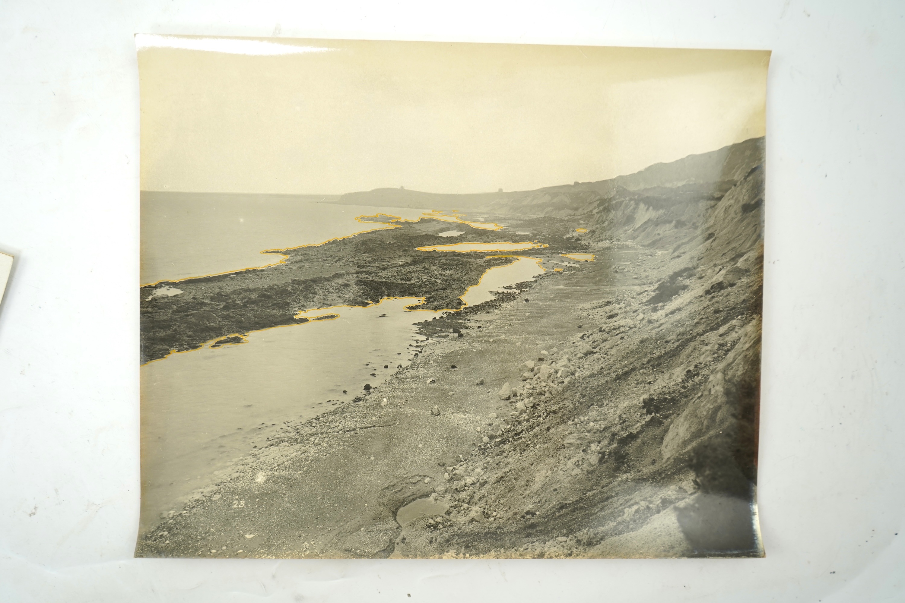 Fourteen late 19th/early 20th century black and white photographs of the results of a chalk landslide on the SE&CR, South East and Chatham Railway, at East Wear Bay, Capel-le-Ferne, Kent, with annotations to the reverse